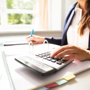 calculator on desk, finances